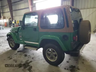 1998 Jeep Wrangler Sahara z VIN 1J4FY49S6WP730035, wystawiony jako Copart lot #59100505 z przebiegiem 225 354 mil mil oraz Szkoda całkowita • Salvage title. Historia ofert i sprzedaży dostępna na DreamBid. Obrazek 2.