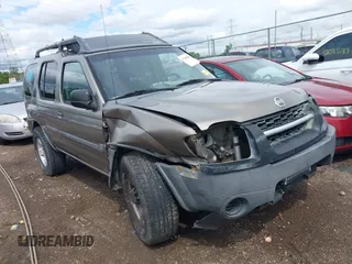 2004 Nissan Xterra XE z VIN 5N1ED28Y74C675845, wystawiony jako IAAI lot #42188304 z przebiegiem 239 021 mil mil oraz . Historia ofert i sprzedaży dostępna na DreamBid. Obrazek 1.