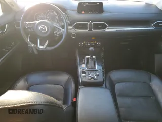2018 Mazda CX-5 Grand Touring with VIN JM3KFBDM7J0370662, listed as a Copart auction lot 48602585 with 67,875 mi miles and Salvage Title. Bid and sale history available at DreamBid. Image 8.