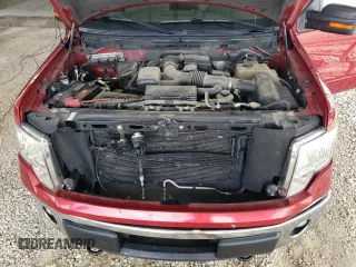 2010 Ford F-150 XL with VIN 1FTFX1EV4AKE15909, listed as a Copart auction lot 58553515 with 126,257 mi miles and Salvage title. Bid and sale history available at DreamBid. Image 11.
