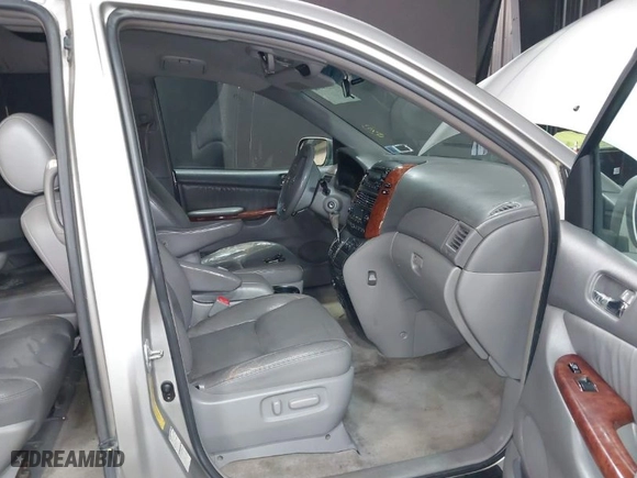 2005 Toyota Sienna XLE with VIN 5TDBA22CX5S036257, listed as a IAAI auction lot 42002366 with 154,584 mi miles. Bid and sale history available at carsss.com. Image 5.