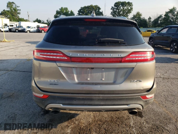 2016 Lincoln MKC Premier with VIN 5LMCJ1D98GUJ20472, listed as a Copart auction lot 59586665 with 100,845 mi miles and Salvage title. Bid and sale history available at DreamBid. Image 6.