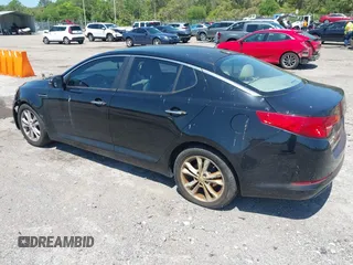 2012 Kia Optima EX with VIN 5XXGN4A70CG042190, listed as a IAAI auction lot 42003619 with 189,622 mi miles. Bid and sale history available at carsss.com. Image 3.