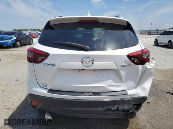 2016 Mazda CX-5 Grand Touring z VIN JM3KE2DYXG0731462, wystawiony jako Copart lot #58220465 z przebiegiem 130 033 mil mil oraz Szkoda całkowita • Salvage title. Historia ofert i sprzedaży dostępna na DreamBid. Obrazek 6.