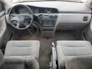 2000 Honda Odyssey EX z VIN 2HKRL186XYH010384, wystawiony jako Copart lot #60871845 z przebiegiem 423 167 mil mil oraz Czysty tytuł • Clean title. Historia ofert i sprzedaży dostępna na DreamBid. Obrazek 8.