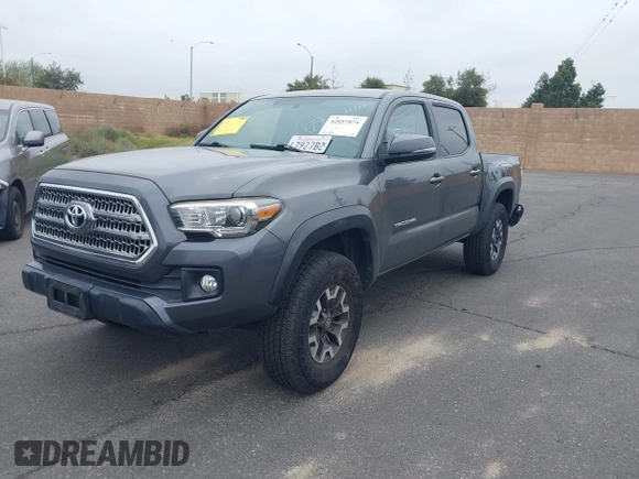 2017 Toyota Tacoma SR5 z VIN 3TMAZ5CN7HM045752, wystawiony jako IAAI lot #42057874 z przebiegiem 89 898 mil mil oraz . Historia ofert i sprzedaży dostępna na DreamBid. Obrazek 2.