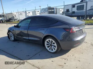 2022 Tesla Model 3 with VIN 5YJ3E1EAXNF360200, listed as a Copart auction lot 44463735 with 86,880 mi miles and Salvage Title. Bid and sale history available at DreamBid. Image 2.