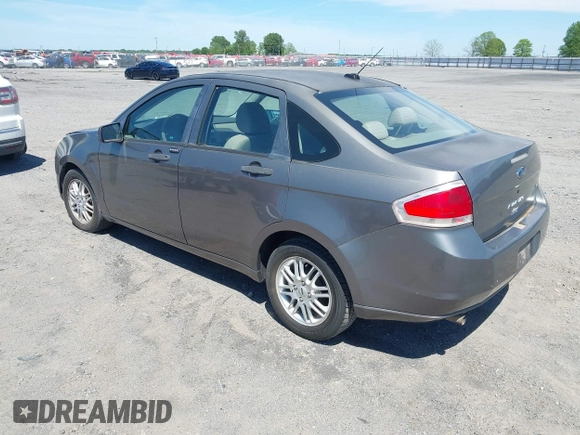 2009 Ford Focus SE with VIN 1FAHP35NX9W108176, listed as a IAAI auction lot 42094209 with 246,714 mi miles. Bid and sale history available at carsss.com. Image 3.