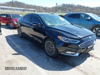 2017 Ford Fusion SE z VIN 3FA6P0HD1HR138693, wystawiony jako IAAI lot #41837634 z przebiegiem 117 638 mil mil oraz . Historia ofert i sprzedaży dostępna na DreamBid. Obrazek 1.