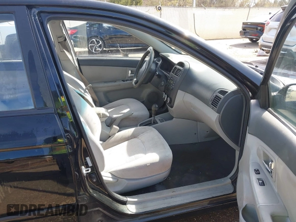 2008 Kia Spectra EX with VIN KNAFE121085549166, listed as a IAAI auction lot 41890354 with 214,401 mi miles. Bid and sale history available at carsss.com. Image 5.