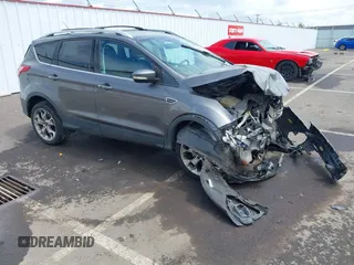 2013 Ford Escape Titanium with VIN 1FMCU9J95DUC95061, listed as a IAAI auction lot 42293047 with 124,641 mi miles and . Bid and sale history available at DreamBid. Image 1.