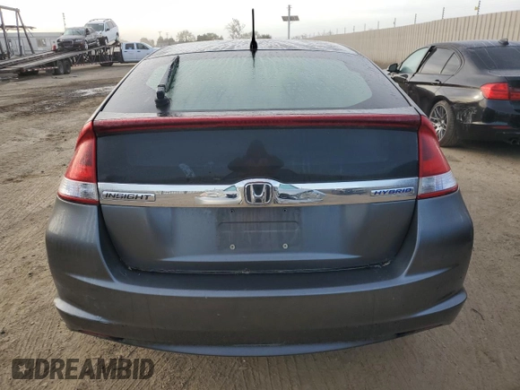 2012 Honda Insight z VIN JHMZE2H32CS000284, wystawiony jako Copart lot #50160335 z przebiegiem 64 074 mil mil oraz Szkoda całkowita • Salvage title. Historia ofert i sprzedaży dostępna na DreamBid. Obrazek 6.