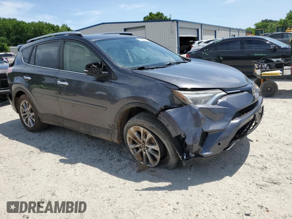 2016 Toyota RAV4 Limited z VIN JTMDFREVXGJ076533, wystawiony jako Copart lot #57480995 z przebiegiem 124 626 mil mil oraz Szkoda całkowita • Salvage title. Historia ofert i sprzedaży dostępna na DreamBid. Obrazek 4.