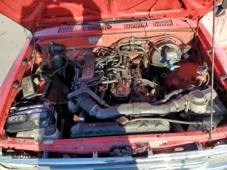 1991 Toyota Pickup z VIN JT4RN81AXM0072912, wystawiony jako Copart lot #86072004 z przebiegiem 210 493 mil mil oraz Szkoda całkowita • Salvage title. Historia ofert i sprzedaży dostępna na DreamBid. Obrazek 11.