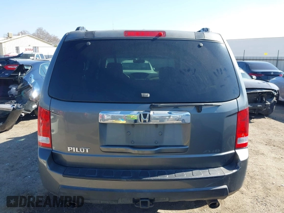 2009 Honda Pilot EX with VIN 5FNYF48439B036957, listed as a IAAI auction lot 41656284 with 199,115 mi miles. Bid and sale history available at carsss.com. Image 16.