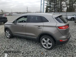 2016 Lincoln MKC Premier with VIN 5LMCJ1D91GUJ11628, listed as a Copart auction lot 49272455 with 143,726 mi miles and Salvage Title. Bid and sale history available at DreamBid. Image 2.