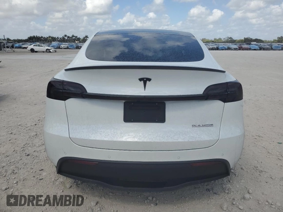 2022 Tesla Model Y Performance with VIN 7SAYGDEFXNF410531, listed as a Copart auction lot 54449715 with Not Provided miles and Non Repairable. Bid and sale history available at DreamBid. Image 6.