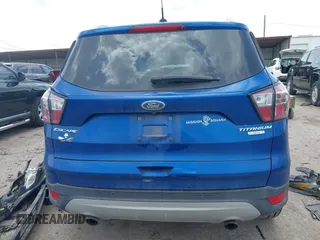 2017 Ford Escape Titanium with VIN 1FMCU0JD3HUE35131, listed as a IAAI auction lot 42062019 with 108,470 mi miles and . Bid and sale history available at DreamBid. Image 17.
