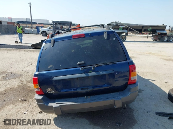 2000 Jeep Grand Cherokee Laredo with VIN 1J4G248S5YC413977, listed as a IAAI auction lot 42045808 with Not provided miles and . Bid and sale history available at DreamBid. Image 16.