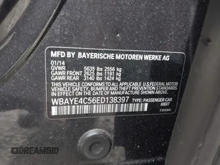 2014 BMW 7 Series 740Li with VIN WBAYE4C56ED138397, listed as a IAAI auction lot 41726117 with 116,291 mi miles. Bid and sale history available at carsss.com. Image 9.