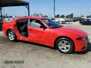 2023 Dodge Charger SXT with VIN 2C3CDXBG4PH643059, listed as a Copart auction lot 52462385 with 5,037 mi miles and Salvage Title. Bid and sale history available at DreamBid. Image 4.