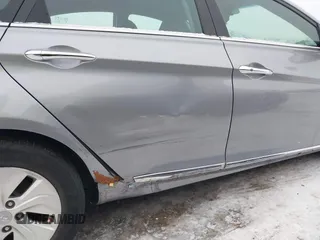2014 Hyundai Sonata Hybrid Limited with VIN KMHEC4A4XEA117023, listed as a IAAI auction lot 41299461 with 154,822 mi miles. Bid and sale history available at carsss.com. Image 6.