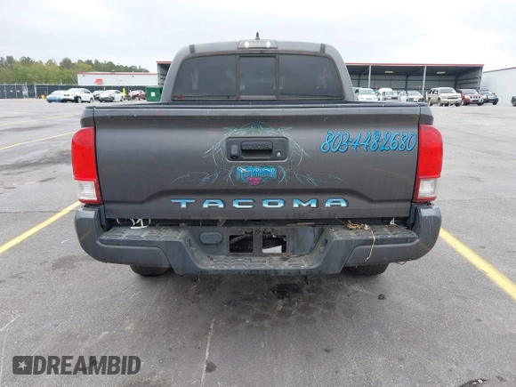 2017 Toyota Tacoma SR with VIN 5TFAX5GN7HX090832, listed as a IAAI auction lot 41903374 with 234,499 mi miles. Bid and sale history available at carsss.com. Image 16.