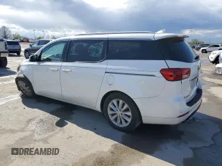 2015 Kia Sedona EX with VIN KNDMC5C14F6050738, listed as a Copart auction lot 52596095 with 142,551 mi miles and Salvage Title. Bid and sale history available at carsss.com. Image 2.