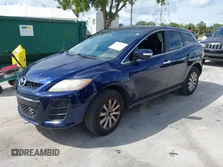 2010 Mazda CX-7 Sport with VIN JM3ER2W5XA0301457, listed as a IAAI auction lot 42257772 with 229,697 mi miles and . Bid and sale history available at DreamBid. Image 2.