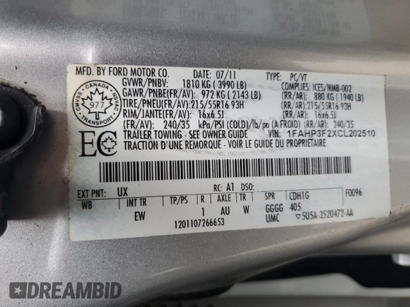 2012 Ford Focus SE with VIN 1FAHP3F2XCL202510, listed as a Copart auction lot 64066545 with 77,828 mi miles and Salvage title. Bid and sale history available at DreamBid. Image 12.