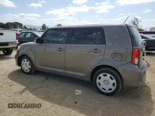 2014 Scion xB z VIN JTLZE4FE6EJ064990, wystawiony jako Copart lot #53554795 z przebiegiem 180 198 mil mil oraz Szkoda całkowita • Salvage title. Historia ofert i sprzedaży dostępna na DreamBid. Obrazek 2.