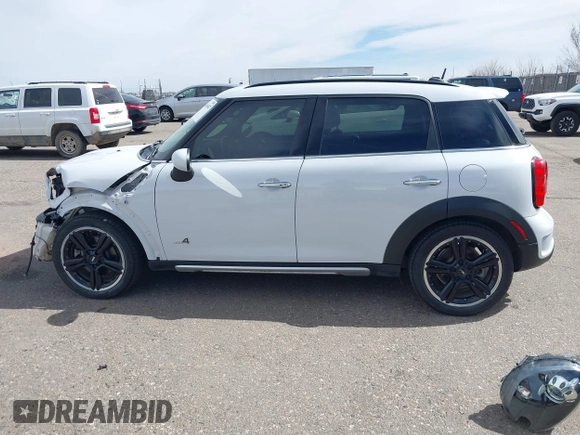 2016 MINI Countryman S with VIN WMWZC5C57GWU22015, listed as a IAAI auction lot 41806547 with 65,124 mi miles and . Bid and sale history available at DreamBid. Image 15.