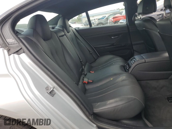 2015 BMW 6 Series 640i xDrive z VIN WBA6B8C53FD453229, wystawiony jako Copart lot #60371214 z przebiegiem 116 624 mil mil oraz Szkoda całkowita • Salvage title. Historia ofert i sprzedaży dostępna na DreamBid. Obrazek 10.