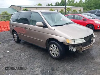 2004 Honda Odyssey EX-L z VIN 5FNRL18024B079462, wystawiony jako IAAI lot #42227175 z przebiegiem 267 661 mil mil oraz . Historia ofert i sprzedaży dostępna na DreamBid. Obrazek 1.