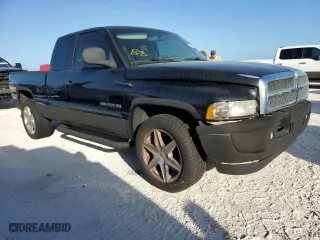 2000 Dodge Ram 1500 with VIN 1B7HC13Z7YJ122323, listed as a Copart auction lot 77254054 with 0 mi miles and Non Repairable. Bid and sale history available at carsss.com. Image 4.