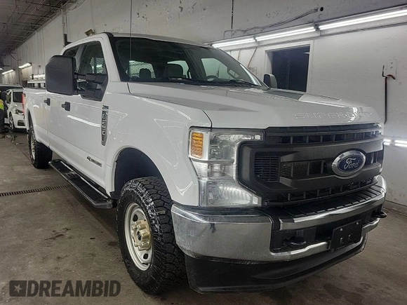 2021 Ford Super Duty F-250 SRW XL with VIN 1FT7W2BT0MEC12003, listed as a IAAI auction lot 42015454 with 100,895 mi miles. Bid and sale history available at carsss.com. Image 1.