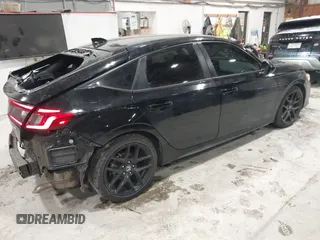 2023 Honda Civic Sport z VIN 19XFL2H85PE007244, wystawiony jako IAAI lot #41572024 z przebiegiem 21 182 mil mil oraz . Historia ofert i sprzedaży dostępna na DreamBid. Obrazek 4.