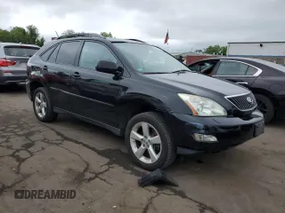 2004 Lexus RX 330 with VIN 2T2HA31U74C007666, listed as a Copart auction lot 56555585 with 200,169 mi miles and Salvage Title. Bid and sale history available at DreamBid. Image 4.