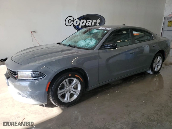 2023 Dodge Charger SXT with VIN 2C3CDXBG2PH587879, listed as a Copart auction lot 54262165 with 60,663 mi miles and Salvage Title. Bid and sale history available at carsss.com. Image 1.