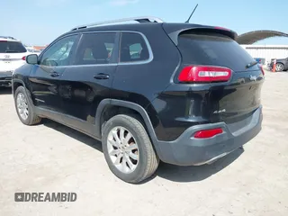 2014 Jeep Cherokee Limited with VIN 1C4PJMDS5EW242544, listed as a IAAI auction lot 42213907 with 114,515 mi miles and . Bid and sale history available at DreamBid. Image 3.