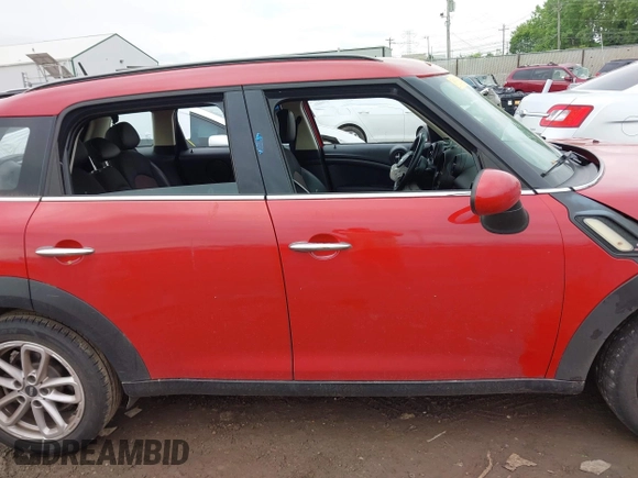2015 MINI Countryman S with VIN WMWZC3C56FWP53249, listed as a IAAI auction lot 42256130 with 104,415 mi miles and . Bid and sale history available at DreamBid. Image 14.