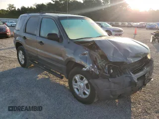 2004 Ford Escape XLT with VIN 1FMYU03154DA18466, listed as a Copart auction lot 70574604 with 168,553 mi miles and Salvage Title. Bid and sale history available at carsss.com. Image 4.
