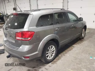 2013 Dodge Journey SXT with VIN 3C4PDDBG4DT600078, listed as a IAAI auction lot 42060076 with 167,943 mi miles and . Bid and sale history available at DreamBid. Image 4.