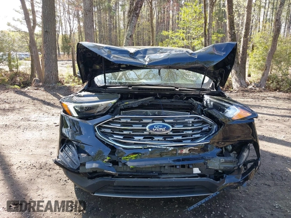 2022 Ford Edge Titanium with VIN 2FMPK4K95NBB06151, listed as a IAAI auction lot 41932545 with 57,762 mi miles and . Bid and sale history available at DreamBid. Image 6.