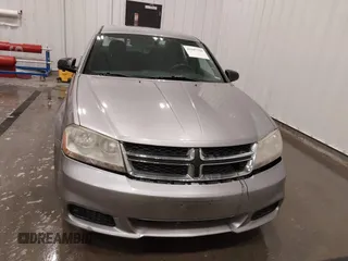 2014 Dodge Avenger SE with VIN 1C3CDZAB4EN148429, listed as a IAAI auction lot 41687320 with 149,084 mi miles and . Bid and sale history available at DreamBid. Image 13.