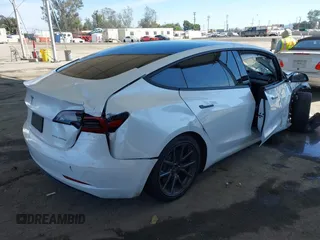2018 Tesla Model 3 Long Range Battery z VIN 5YJ3E1EB3JF187543, wystawiony jako IAAI lot #41879169 z przebiegiem 74 144 mil mil oraz . Historia ofert i sprzedaży dostępna na DreamBid. Obrazek 4.