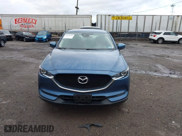 2019 Mazda CX-5 Sport with VIN JM3KFBBM5K0668678, listed as a IAAI auction lot 41811146 with 102,634 mi miles and . Bid and sale history available at DreamBid. Image 12.