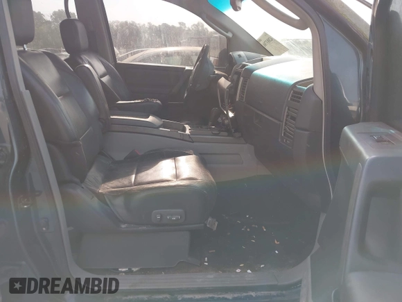 2004 Nissan Titan LE with VIN 1N6AA07A84N549757, listed as a IAAI auction lot 42083786 with 313,053 mi miles and . Bid and sale history available at DreamBid. Image 5.