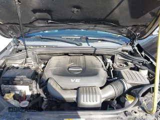 2014 Jeep Grand Cherokee Overland with VIN 1C4RJECG4EC523747, listed as a IAAI auction lot 40802143 with 124,079 mi miles. Bid and sale history available at carsss.com. Image 10.