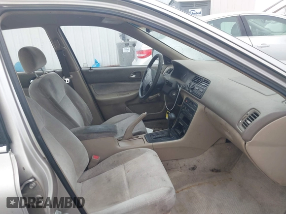 1997 Honda Accord Value with VIN 1HGCD568XVA184006, listed as a IAAI auction lot 41818518 with 276,230 mi miles and . Bid and sale history available at carsss.com. Image 5.